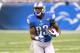 DETROIT, MI - OCTOBER 25: Tim Wright #83 of the Detroit Lions runs with the football during the game against the Minnesota Vikings at Ford Field on October 25, 2015 in Detroit, Michigan. The Vikings defeated the Lions 28-19. (Photo by Mark Cunningham/Detroit Lions/Getty Images)