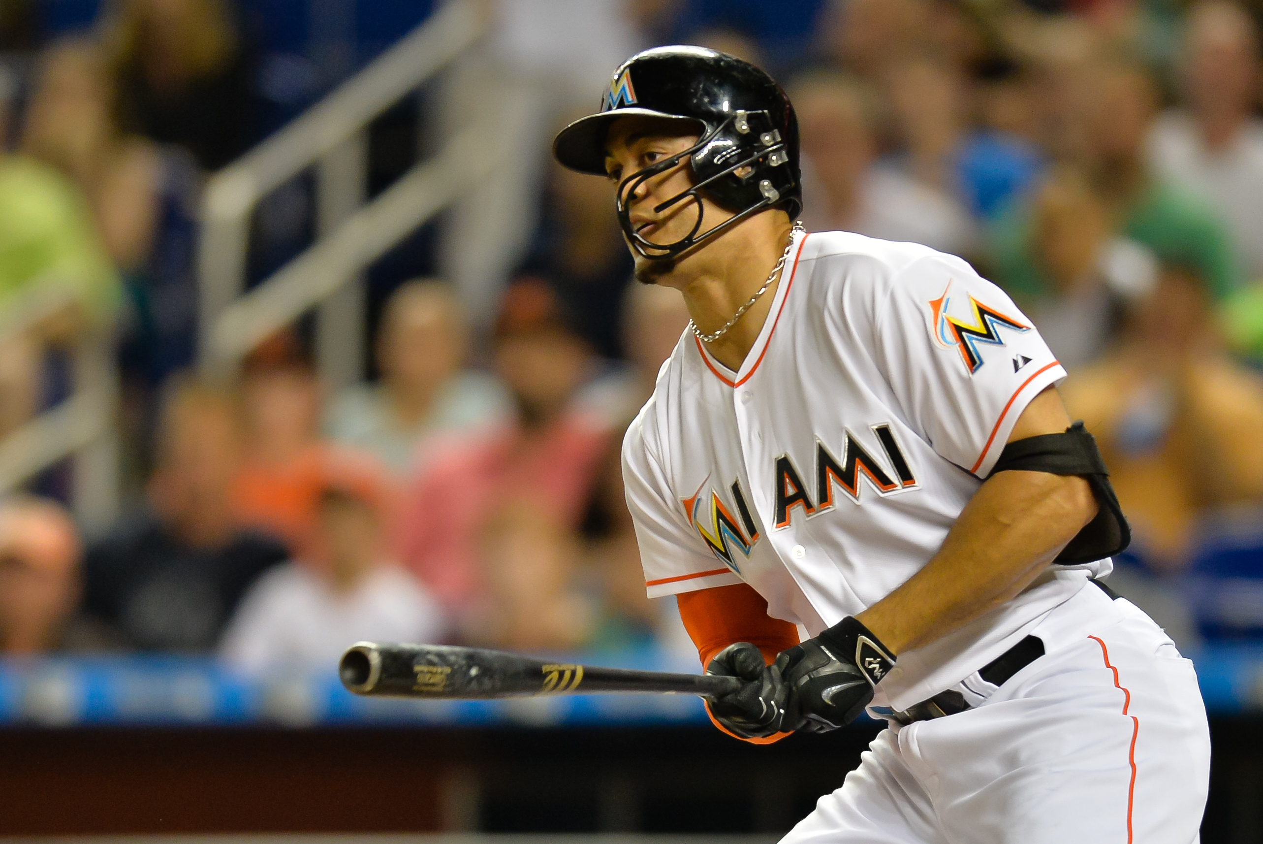 Giancarlo Stanton of the Miami Marlins wears Nike batting gloves