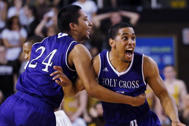 Holy Cross forward Eric Green (24) and guard Cullen Hamilton celebrate after defeating Lehigh 59-56 in the NCAA college basketball Patriot League Championship game at Lehigh in Bethlehem, Pa., Wednesday, March 9, 2016. (AP Photo/Rich Schultz)