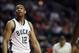 Milwaukee Bucks forward Jabari Parker looks up a score board during the second half of an NBA basketball game against the Chicago Bulls Monday, March 7, 2016, in Chicago. The Bulls won 100-90. (AP Photo/Nam Y. Huh)
