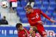 Mar 6, 2016; Harrison, NJ, USA; Toronto FC defender Damien Perquis (24) heads the ball away from New York Red Bulls midfielder Dax McCarty (11) during second half at Red Bull Arena.The Toronto FC defeated the New York Red Bulls 2-0. Mandatory Credit: Noah K. Murray-USA TODAY Sports
