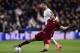 Real Madrid's Portuguese forward Cristiano Ronaldo (L) vies with Roma's defender from Greece Kostas Manolas during the UEFA Champions League round of 16, second leg football match Real Madrid FC vs AS Roma at the Santiago Bernabeu stadium in Madrid on March 8, 2016. / AFP / JAVIER SORIANO (Photo credit should read JAVIER SORIANO/AFP/Getty Images)