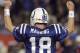 FILE - In this Feb. 7, 2010, file photo, Indianapolis Colts quarterback Peyton Manning celebrates after teammate Joseph Addai scored a touchdown during the second half of the NFL Super Bowl XLIV football game against the New Orleans Saints in Miami. A person with knowledge of the decision tells The Associated Press on Sunday, March 6, 2016, that Manning has informed the Denver Broncos he's going to retire. (AP Photo/Julie Jacobson, File)
