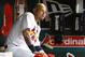 St. Louis Cardinals catcher Yadier Molina looks on from the dugout during a baseball game against the Cincinnati Reds, Wednesday, July 29, 2015, in St. Louis. (AP Photo/Billy Hurst)