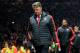 United manager Louis van Gaal walks to the bench during the Europa League round of 16, second leg, soccer match between Manchester United and Liverpool at Old Trafford Stadium in Manchester, England, Thursday March 17, 2016. (AP Photo/Jon Super)