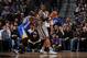 SAN ANTONIO, TX - MARCH 19: LaMarcus Aldridge #12 of the San Antonio Spurs handles the ball against Draymond Green #23 of the Golden State Warriors on March 19, 2016 at the AT&T Center in San Antonio, Texas. NOTE TO USER: User expressly acknowledges and agrees that, by downloading and or using this photograph, user is consenting to the terms and conditions of the Getty Images License Agreement. Mandatory Copyright Notice: Copyright 2016 NBAE (Photos by Garrett Ellwood/NBAE via Getty Images)