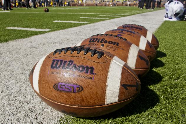 Northwestern's footballs are seen lined up on the sideline on the field before an NCAA college football game against Michigan at Michigan Stadium in Ann Arbor, Mich., Saturday, Oct. 10, 2015. (AP Photo/Tony Ding)
