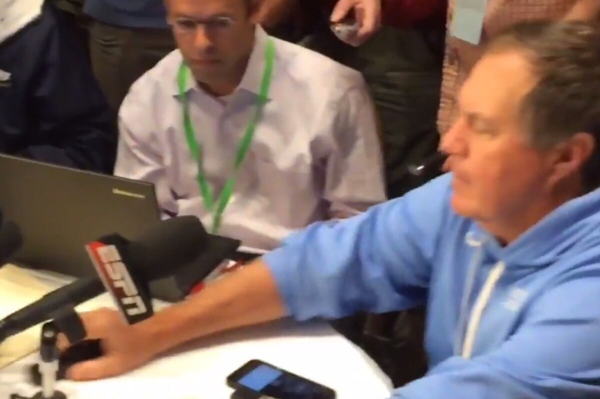 Patriots' Bill Belichick Pushes Reporters' Recorders out of His