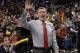 Craig Sager, acknowledges the crowd during a timeout of a game between the Chicago Bulls and the Oklahoma City Thunder, Thursday, March 5, 2015 in Chicago. Craig Sager returned to his familiar spot on the NBA sideline Thursday after being treated for leukemia. (AP Photo/David Banks)