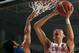 China's Zhou Qi (R) goes to the basket as the Philippines' Ranidel De Ocampo (L) defends the during the final match between China and Philippines at the FIBA Asia Basketball championship on October 3, 2015 in Changsha. AFP PHOTO ==CHINA OUT== (Photo credit should read STR/AFP/Getty Images)