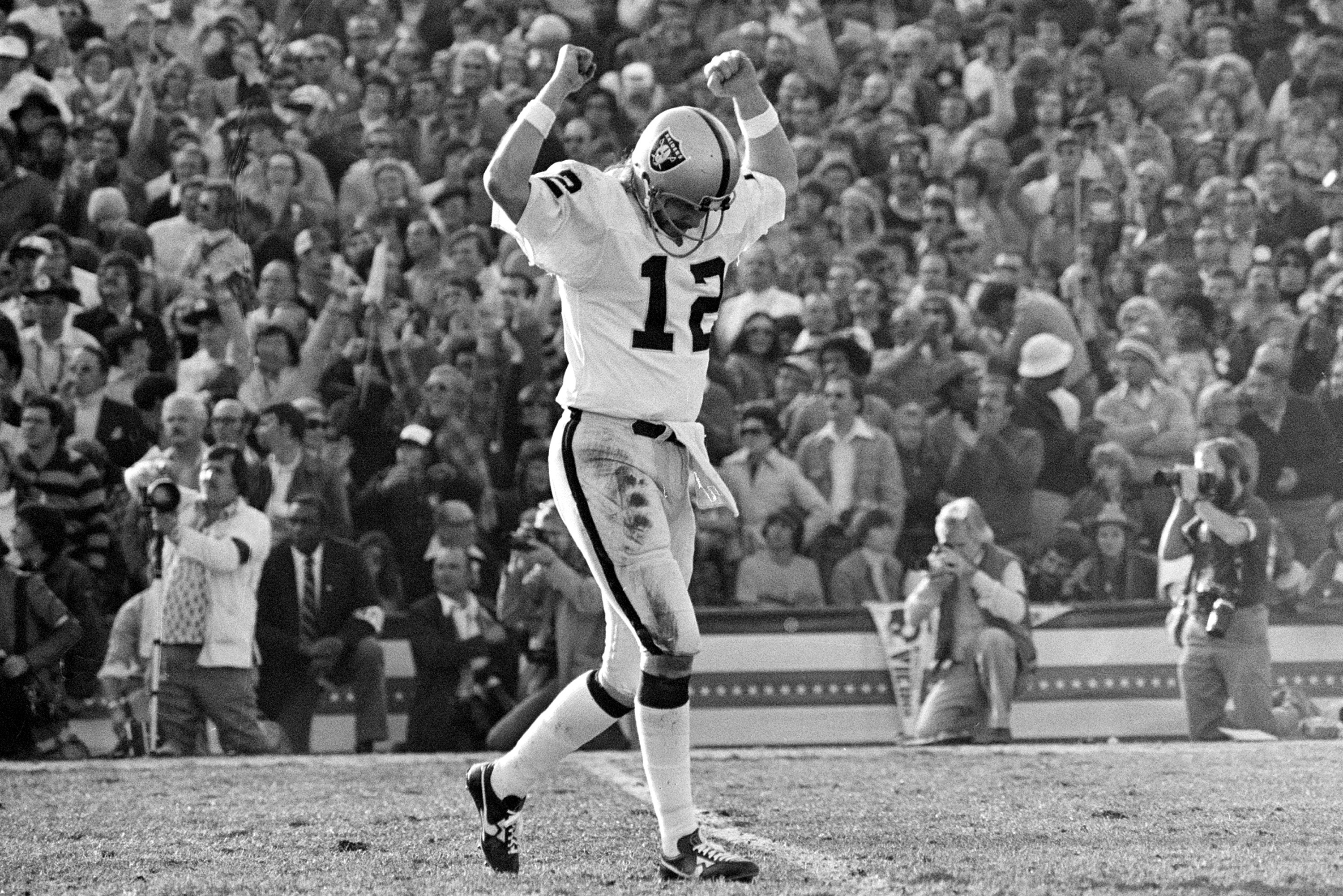 Defensive Tackle Art Thoms of the Oakland Raiders tackles Running