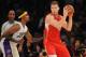 December 25, 2015; Los Angeles, CA, USA; Los Angeles Clippers forward Blake Griffin (32) moves the ball against Los Angeles Lakers forward Nick Young (0) during the second half of an NBA basketball game on Christmas at Staples Center. Mandatory Credit: Gary A. Vasquez-USA TODAY Sports