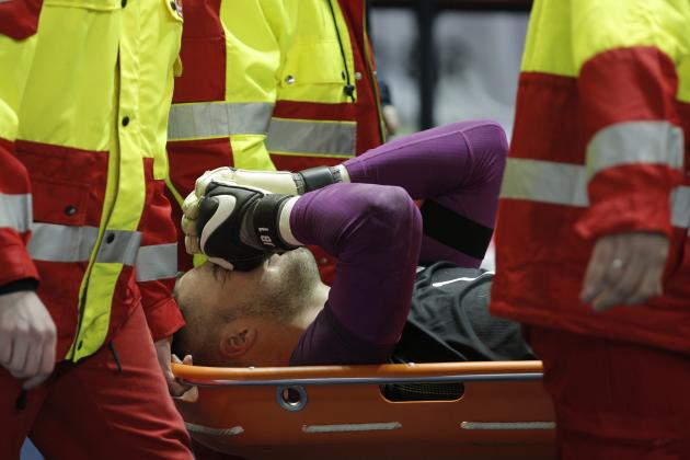 England’s goalkeeper Jack Butland lies on a stretcher after suffering an injury during a friendly soccer match between Germany and England in Berlin, Germany, Saturday, March 26, 2016. (AP Photo/Gero Breloer)