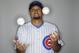 Chicago Cubs' Shane Victorino juggles some baseballs during the teams photo day Monday, Feb. 29, 2016, in Mesa, Ariz. (AP Photo/Morry Gash)