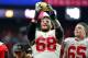 GLENDALE, AZ - JANUARY 01: Offensive lineman Taylor Decker #68 of the Ohio State Buckeyes holds the Fiesta Bowl trophy after the BattleFrog Fiesta Bowl at University of Phoenix Stadium on January 1, 2016 in Glendale, Arizona. The Ohio State Buckeyes beat the Notre Dame Fighting Irish 44-28. (Photo by Jennifer Stewart/Getty Images)