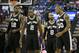 San Antonio Spurs, from left, LaMarcus Aldridge, Kawhi Leonard, Patty Mills, of Australia, and David West walk on to the court during the first quarter of an NBA preseason basketball game against the Sacramento Kings in Sacramento, Calif., Thursday Oct. 8, 2015. The Kings won 95-92.(AP Photo/Rich Pedroncelli)