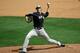 New York Yankees' Andrew Miller pitches against the Atlanta Braves in a spring training baseball game, Wednesday, March 30, 2016, in Kissimmee, Fla. Miller was struck on the right arm by a line drive after the pitch, forcing the left-handed reliever to leave the game. (AP Photo/John Raoux)