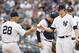 New York Yankees manager Joe Girardi (28) takes the ball from Yankees relief pitcher Bryan Mitchell, who was the losing pitcher in Yankees 9-5 loss to the Toronto Blue Jays in the first baseball game of a doubleheader at Yankee Stadium in New York, Saturday, Sept. 12, 2015. (AP Photo/Kathy Willens)
