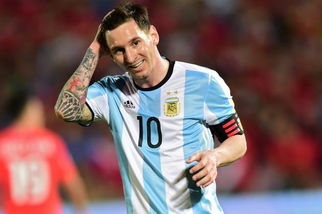 Argentina's Lionel Messi smiles during the Russia 2018 FIFA World Cup South American Qualifiers' football match against Chile, in Santiago on March 24, 2016.   AFP PHOTO / MARTIN BERNETTI / AFP / MARTIN BERNETTI        (Photo credit should read MARTIN BERNETTI/AFP/Getty Images)