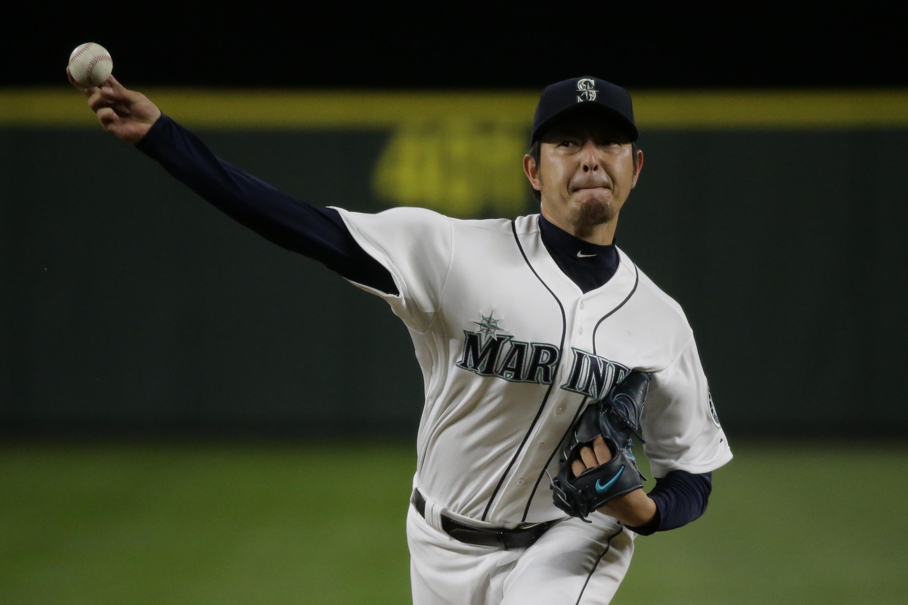 Starting pitcher Hisashi Iwakuma of the Seattle Mariners pitches