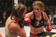 Marloes Coenen punches Miesha Tate in Strikeforce in 2011.
