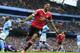 Rashford celebrates his goal at the Etihad Stadium.