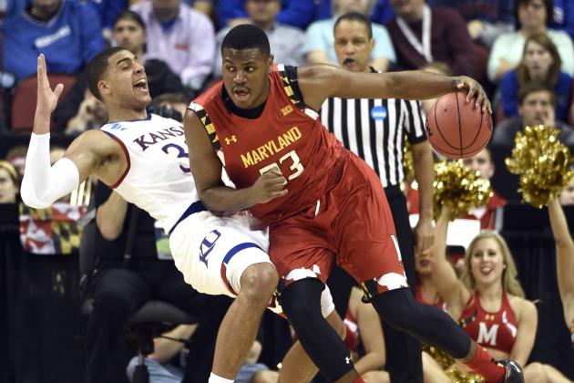 Maryland center Diamond Stone, right, charges into Kansas forward Landen Lucas during the second half of an NCAA college basketball game in the regional semifinals of the men's NCAA Tournament, in Louisville, Ky., Thursday, March 24, 2016. Kansas won 79-63. (AP Photo/John Flavell)