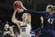 Connecticut's Breanna Stewart, left, goes up for a shot against Duquesne's Kadri-Ann Lass during the first half of a second round of a women's college basketball game in the NCAA Tournament, Monday, March 21, 2016, in Storrs, Conn. (AP Photo/Jessica Hill)