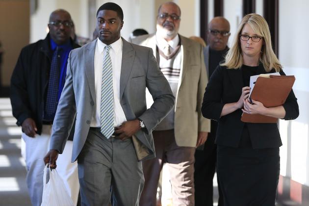 Former Vanderbilt University football player Cory Batey, front left, arrives for jury selection in his trial Monday, Nov. 3, 2014, in Nashville, Tenn. Batey and former teammate Brandon Vandenburg are charged with the rape of an unconscious 21-year-old female student on June 23, 2013. (AP Photo/Mark Humphrey)