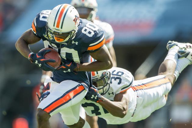 AUBURN, AL - APRIL 9: Wide receiver Marcus Davis #80 of the Auburn Tigers catches a ball in front of defensive back Michael Sherwood #36 of the Auburn Tigers at Jordan Hare Stadium on April 9, 2016 in Auburn, Alabama. (Photo by Michael Chang/Getty Images)