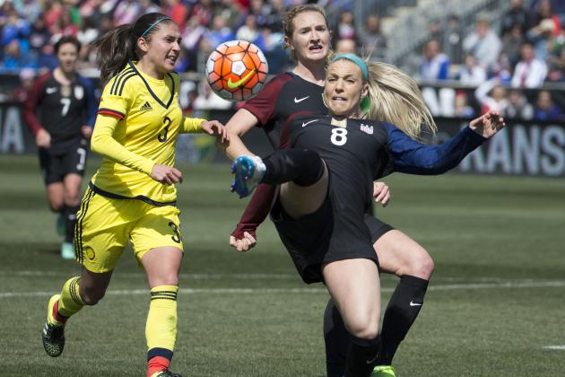 United States' Julie Johnston (8) kicks the ball away from Colombia's Natalia Gaitán (3) as it goes in for a goal during the first half of an international friendly soccer match, Sunday, April 10, 2016, in Chester, Pa. (AP Photo/Chris Szagola)