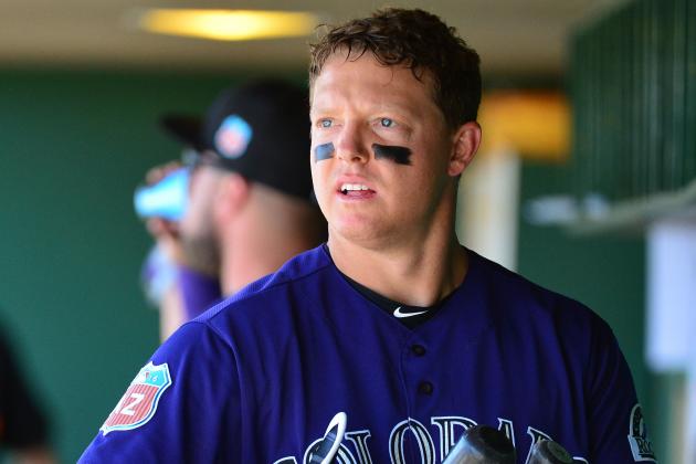 SCOTTSDALE, AZ - MARCH 09:  Nick Hundley #4 of the Colorado Rockies watches the spring training game against the San Francisco Giants from the dugout at Scottsdale Stadium on March 9, 2016 in Scottsdale, Arizona.  The Colorado Rockies won 8-6. (Photo by Jennifer Stewart/Getty Images)