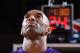 HOUSTON, TX - APRIL 10: Kobe Bryant #24 of the Los Angeles Lakers stands for the national anthem before the game against the Houston Rockets on April 10, 2016 at the Toyota Center in Houston, Texas. NOTE TO USER: User expressly acknowledges and agrees that, by downloading and or using this photograph, User is consenting to the terms and conditions of the Getty Images License Agreement. Mandatory Copyright Notice: Copyright 2016 NBAE (Photo by Andrew D. Bernstein/NBAE via Getty Images)