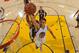 OAKLAND, CA - APRIL 13: Stephen Curry #30 of the Golden State Warriors drives to the basket against the Memphis Grizzlies on April 13, 2016 at Oracle Arena in Oakland, California. NOTE TO USER: User expressly acknowledges and agrees that, by downloading and or using this photograph, user is consenting to the terms and conditions of Getty Images License Agreement. Mandatory Copyright Notice: Copyright 2016 NBAE (Photo by Garrett Ellwood/NBAE via Getty Images)