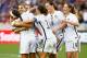 HOUSTON, TX - FEBRUARY 21: Tobin Heath #17 of the United States gets mobbed by her teammates after Heath scored a second half goal against Canada during the Championship final of the 2016 CONCACAF Women's Olympic Qualifying at BBVA Compass Stadium on February 21, 2016 in Houston, Texas. (Photo by Scott Halleran/Getty Images)