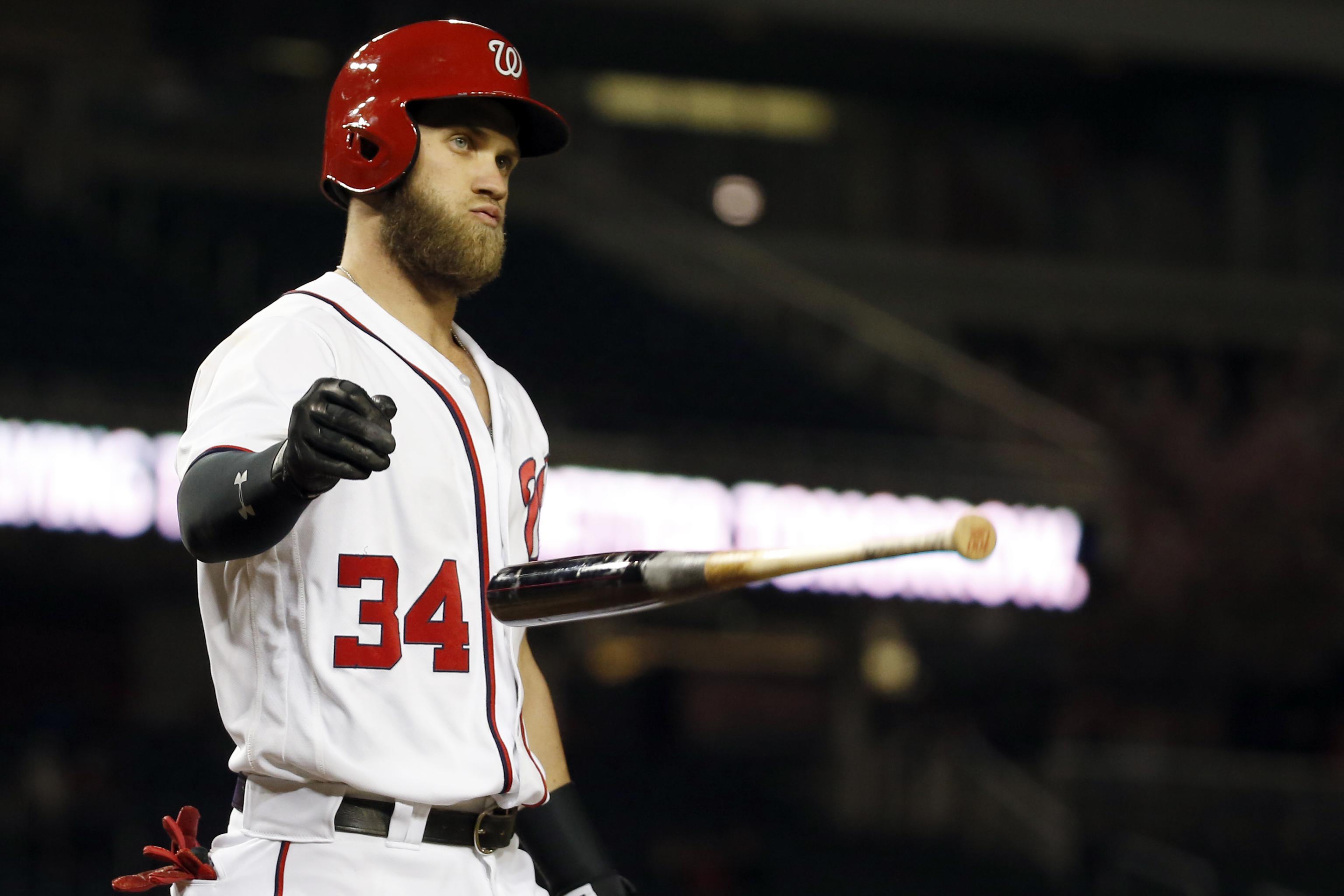 Bryce Harper hits 1st slam, 100th HR in Nationals win over Braves