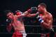 DALLAS, TX - NOVEMBER 28: Welterweight fighters Errol Spence Jr. and Alejandro Barrera exchange punches during the Premier Boxing Champions at Bomb Factory on November 28, 2015 in Dallas, Texas. (Photo by Sarah Crabill/Getty Images)