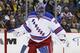 New York Rangers goalie Henrik Lundqvist (30) returns to the goal crease after colliding with teammate Ryan McDonagh (27) during the second period of NHL hockey game against the Pittsburgh Penguins in Pittsburgh, Thursday, March 3, 2016. (AP Photo/Gene J. Puskar)