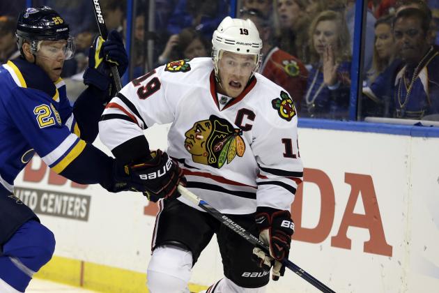 Chicago Blackhawks' Jonathan Toews controls the puck as St. Louis Blues' Paul Stastny, left, defends during the first period in Game 2 of an NHL hockey first-round Stanley Cup playoff series Friday, April 15, 2016, in St. Louis. (AP Photo/Jeff Roberson)