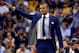 Phoenix Suns head coach Earl Watson makes a call during the first half of an NBA basketball game against the Los Angeles Lakers, Wednesday, March 23, 2016, in Phoenix. (AP Photo/Matt York)