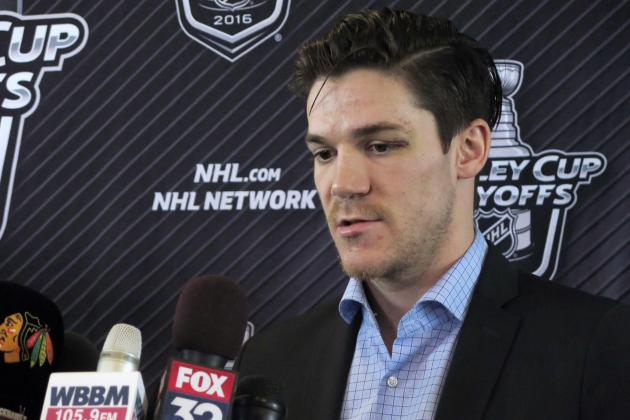 Chicago Blackhawks forward Andrew Shaw talks to reporters before the team left for St. Louis on Wednesday, April 20, 2016, at Chicago's O'Hare International Airport. Blackhawks forward Andrew Shaw apologized Wednesday for yelling an anti-gay slur at someone on the ice after he was sent to the penalty box late in Chicago's Game 4 loss at home to the St. Louis Blues. (AP Photo/Carrie Antlfinger)