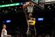 Indiana Pacers forward Paul George, center, scores a basket during the first half of an NBA basketball game against the Brooklyn Nets, Saturday, March 26, 2016, at New York. (AP Photo/Mary Altaffer)