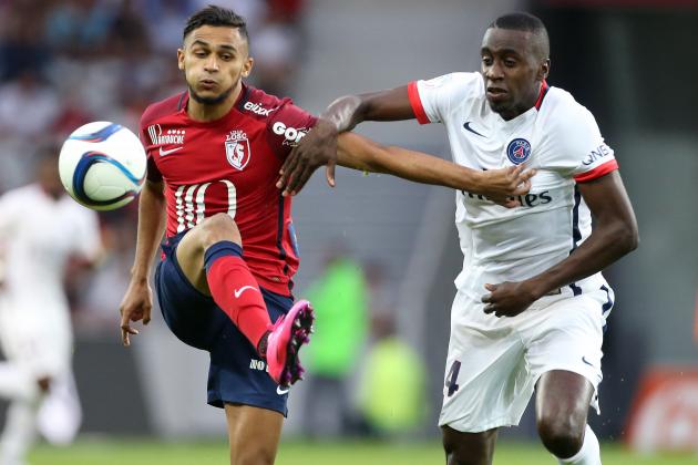 LILLE - AUGUST 7: Sofiane Boufal of Lille and Blaise Matuidi of PSG in action during the French Ligue 1 match between Lille OSC (LOSC) and Paris Saint-Germain (PSG) at Grand Stade Pierre Mauroy on August 7, 2015 in Lille, France. (Photo by Jean Catuffe/Getty Images)