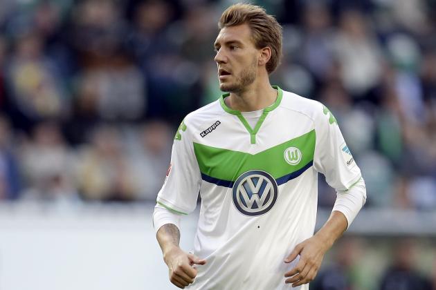 Wolfsburg's Nicklas Bendtner during the German Bundesliga soccer match between VfL Wolfsburg and Hannover 96 in Wolfsburg, Germany, Saturday, Sept. 26, 2015. (AP Photo/Michael Sohn)