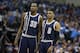 Oklahoma City Thunder forward Kevin Durant (35) and guard Russell Westbrook (0) watch a free throw during the first half in Game 3 of a first-round NBA basketball playoff series against the Dallas Mavericks Thursday, April 21, 2016, in Dallas. (AP Photo/LM Otero)
