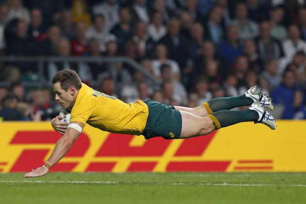 Australia's Bernard Foley scores his second try during the Rugby World Cup Pool A match between England and Australia at Twickenham stadium in London, Saturday, Oct. 3, 2015 (AP Photo/Christophe Ena)