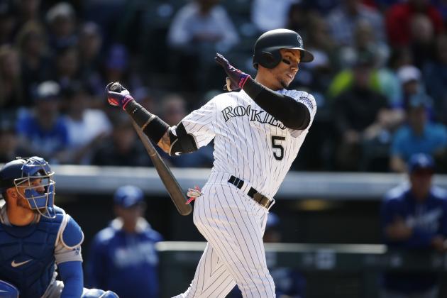Colorado Rockies right fielder Carlos Gonzalez (5) bats in the fourth inning of a baseball game Sunday, April 24, 2016, in Denver. The Dodgers won 12-10. (AP Photo/David Zalubowski)