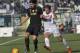 Carpi's Lorenzo Lollo, right, vies for the ball with Juventus' Sami Khedira during their Serie A soccer match at Modena's Braglia stadium, Italy, Sunday, Dec.20, 2015. (AP Photo/Marco Vasini)