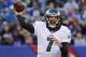 FILE - In this Sunday, Jan. 3, 2016 file photo, Philadelphia Eagles quarterback Sam Bradford (7) passes the ball against the New York Giants during an NFL football game in East Rutherford, N.J. Sam Bradford has agreed to a two-year contract with the Philadelphia Eagles, Tuesday, March 1, 2016. (AP Photo/Julio Cortez, File)