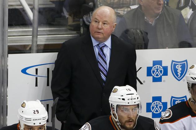 Anaheim Ducks head coach Bruce Boudreau stands behind his bench during an NHL hockey game against the Pittsburgh Penguins in Pittsburgh, Monday, Feb. 8, 2016. The Penguins won 6-2. (AP Photo/Gene J. Puskar)
